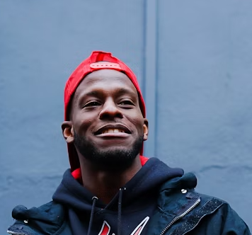 man in a red cap