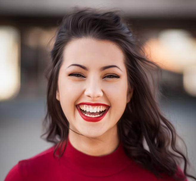 young girl in a red turtleneck